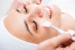 Woman smiling getting pampered